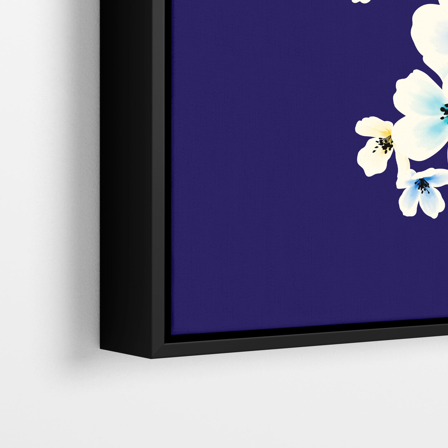 Close-up detail of Blossom Blue framed floral print - luminous watercolour apple blossoms with dark centres on navy background