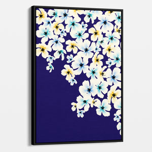 Framed Blossom Blue floral wall art angled view showing frame depth - painterly five-petalled flowers in yellow, turquoise and blue