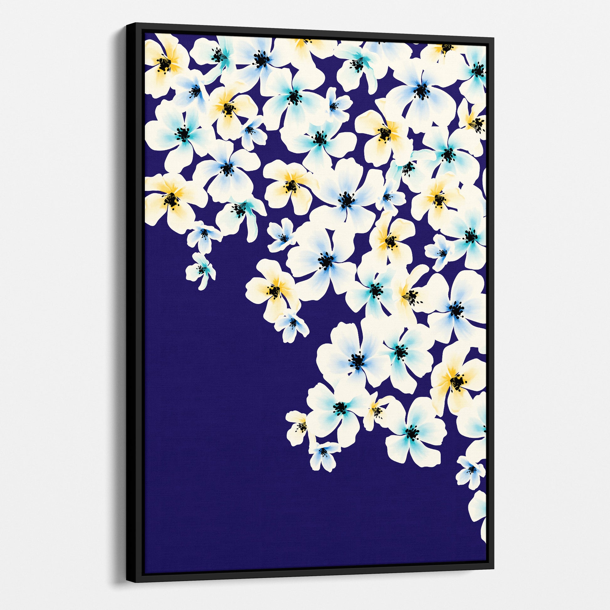 Framed Blossom Blue floral wall art angled view showing frame depth - painterly five-petalled flowers in yellow, turquoise and blue