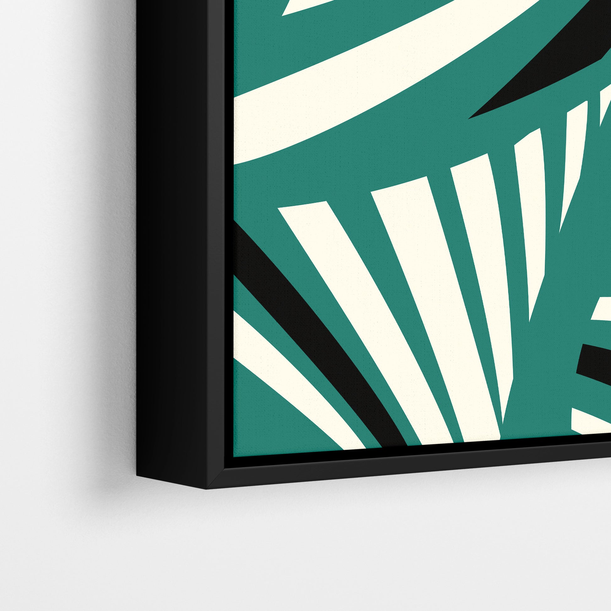 Close-up detail of Charleston Teal framed Art Deco print - radiating geometric forms with tropical foliage in tranquil teal three-tone palette