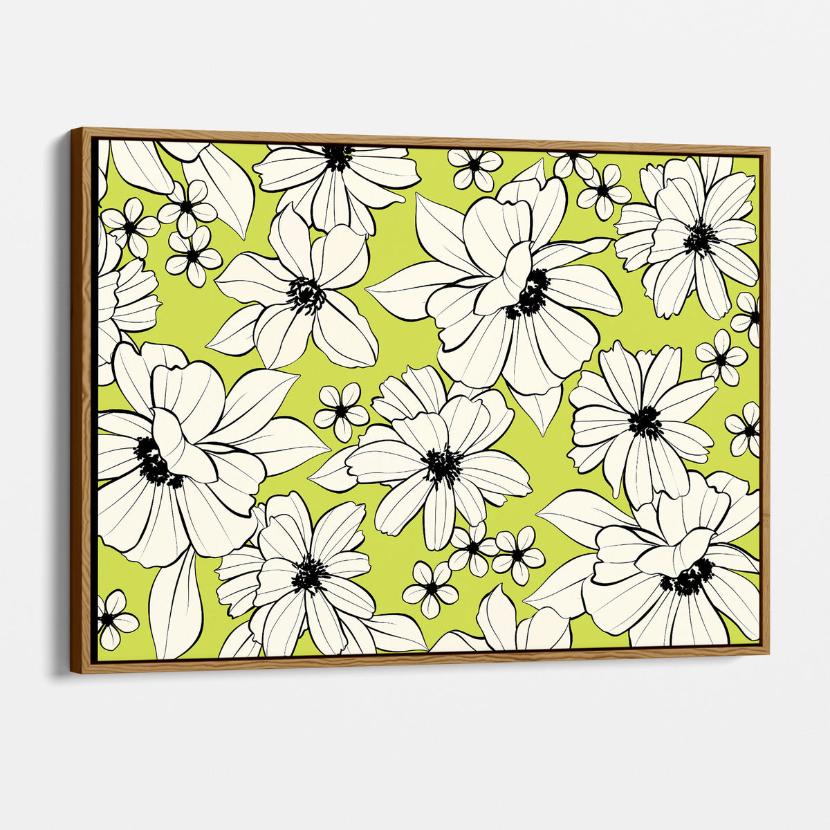 Florian Lime a framed canvas wall art featuring a repeating floral pattern with large white flowers and small blossoms outlined in black on a bright yellow-green background, shown in a oak wood frame against a light grey wall.