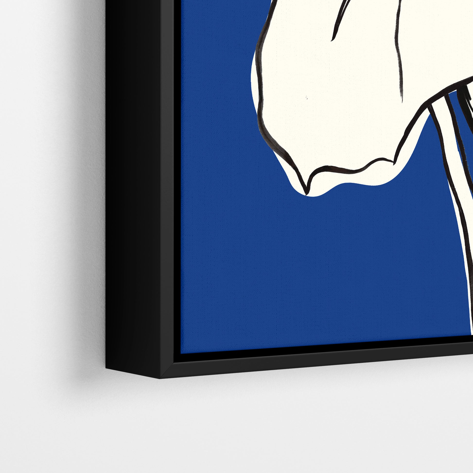 Close-up detail of framed Iris Blue print — fine botanical iris line drawing with expressive petal detail against deep cobalt blue background