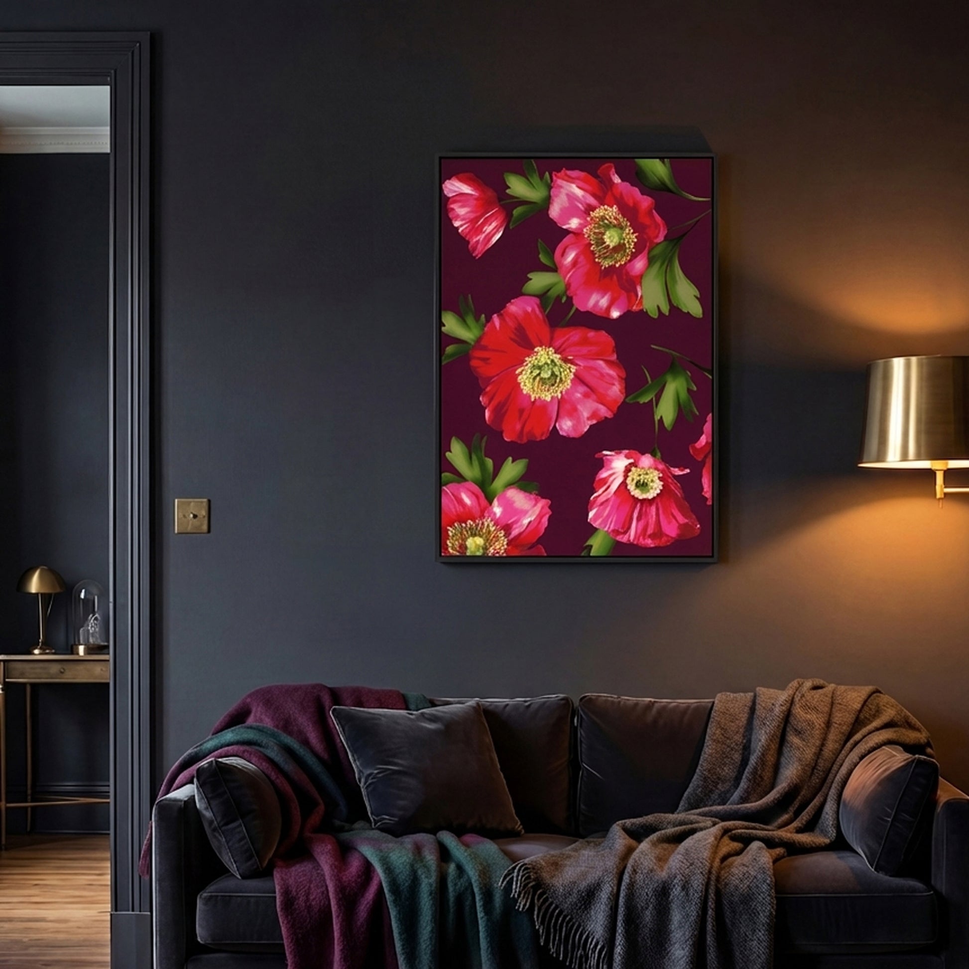 Isla Burgundy on a dark wall above a sofa with colourful blankets.