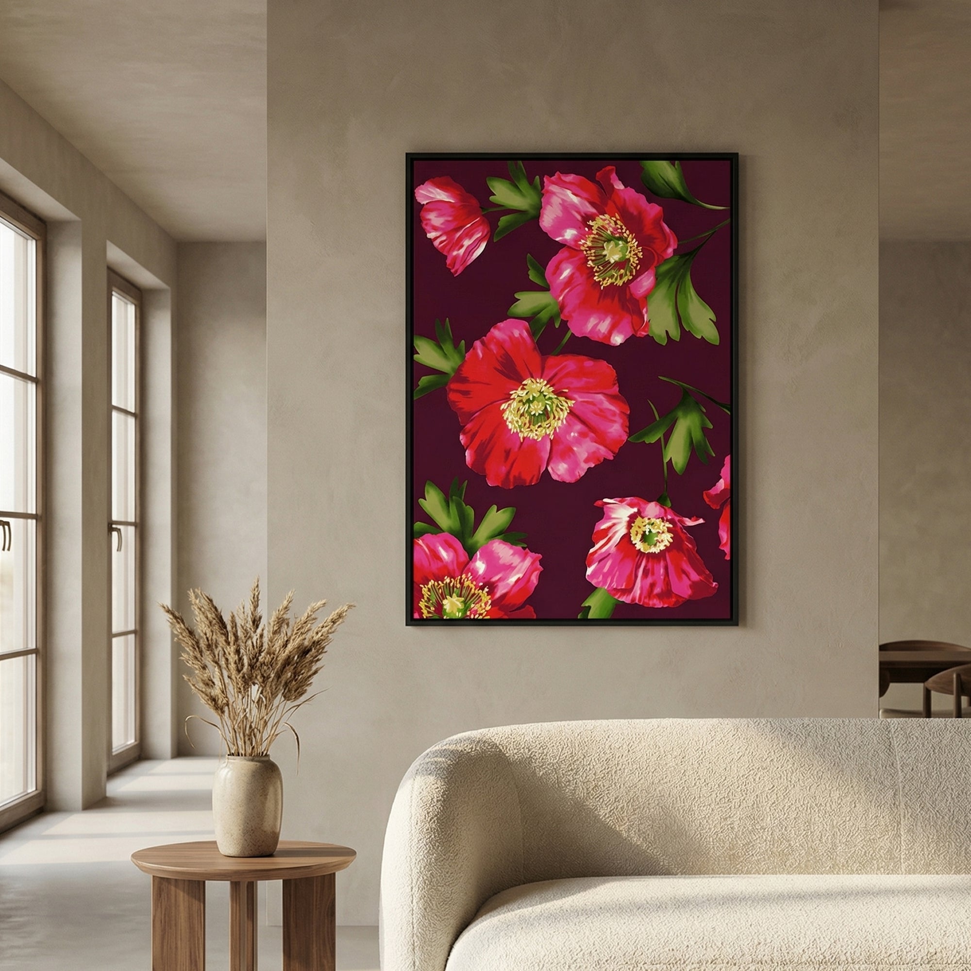The Isla Burgundy Floral wall art is on a wall in a living room with a couch and side table.
