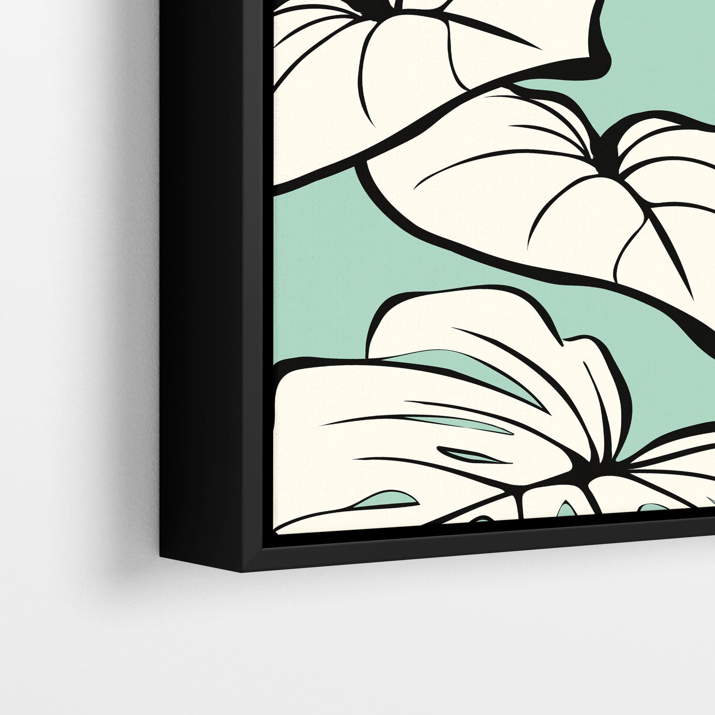 Close-up detail of Kai Mint framed botanical print - large tropical leaves with distinctive splits and heart shapes on mint background