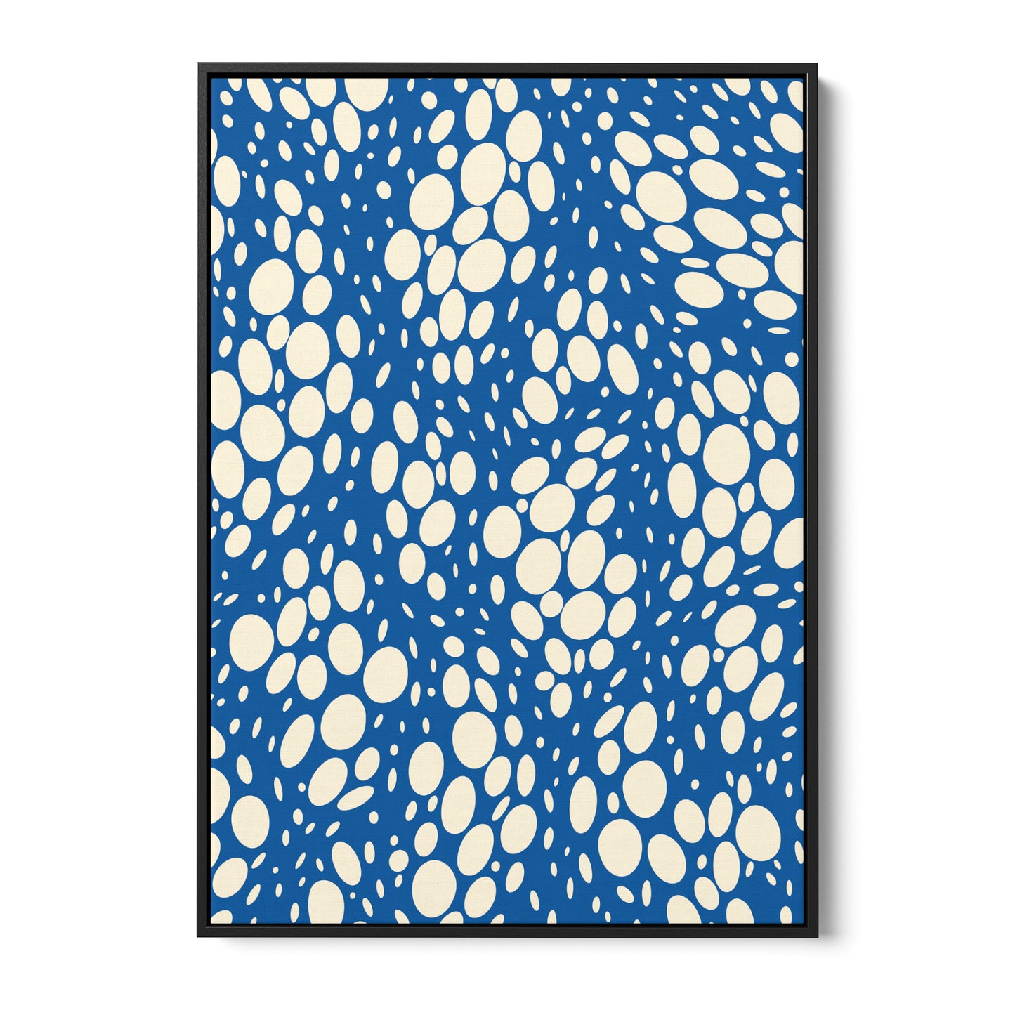 Spots Blue abstract wall art - vibrant pattern with irregular white ovals on bold blue background, framed print front view