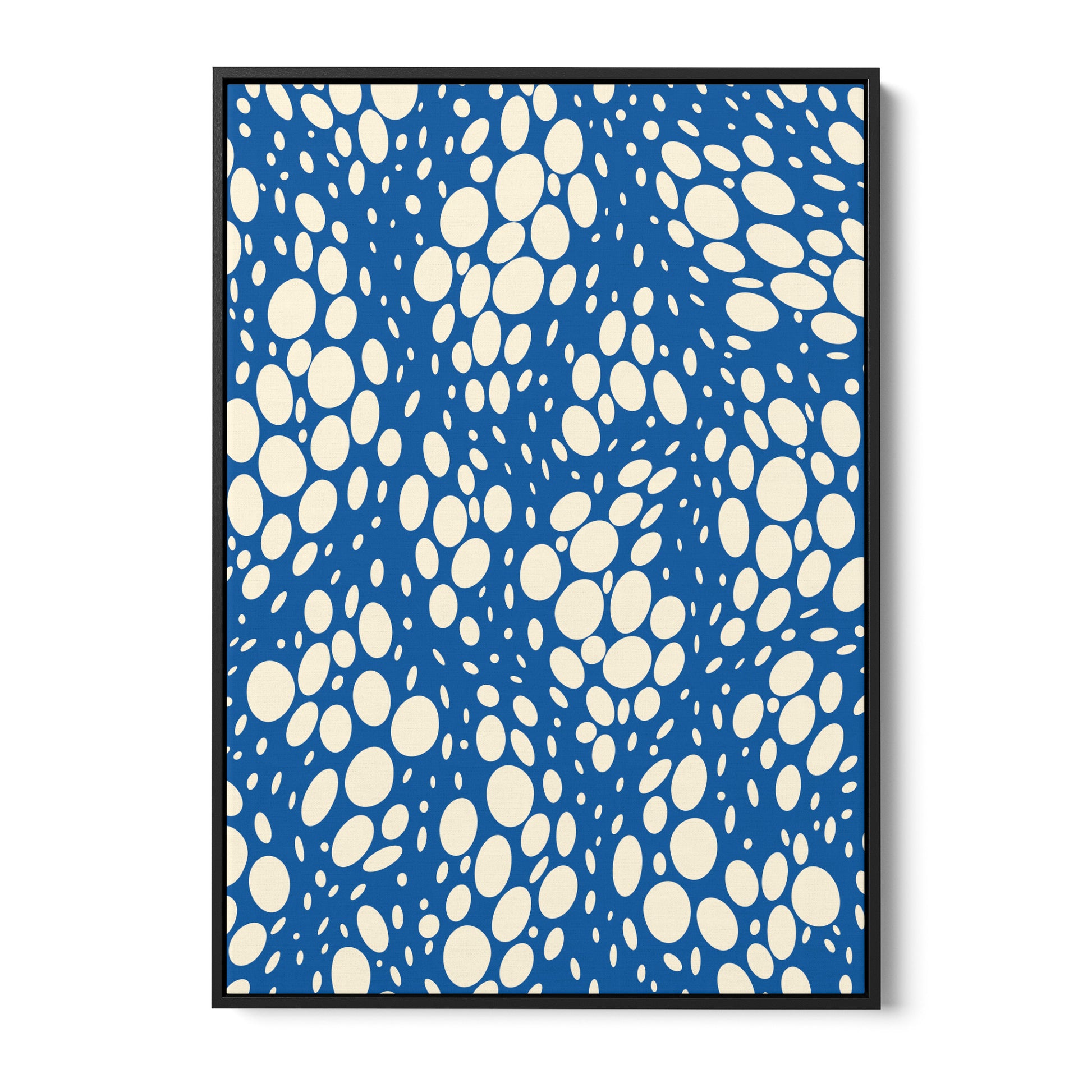 Spots Blue abstract wall art - vibrant pattern with irregular white ovals on bold blue background, framed print front view
