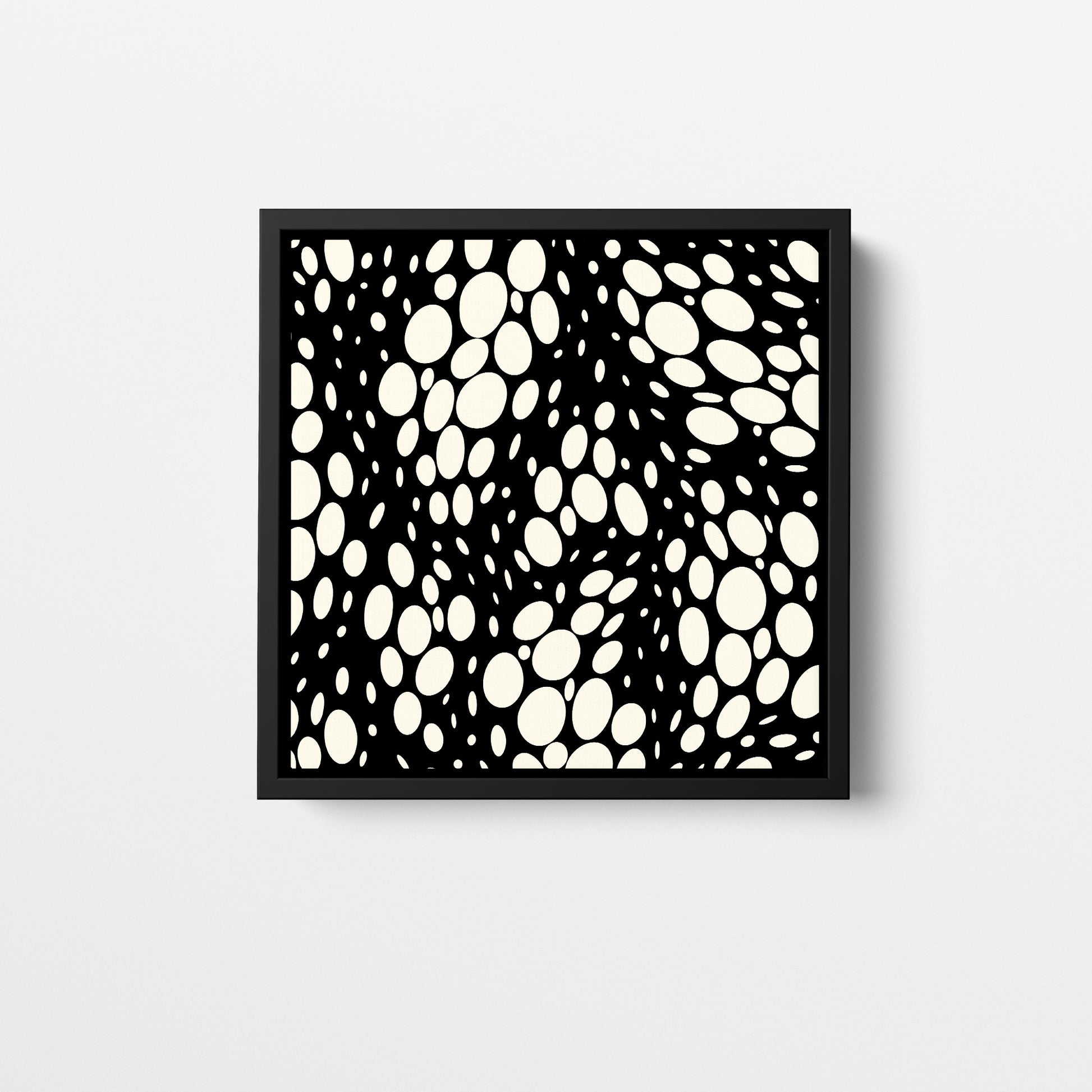 Spots black mini square abstract wall art - monochromatic pattern with irregular cream ovals on black background, framed print front view