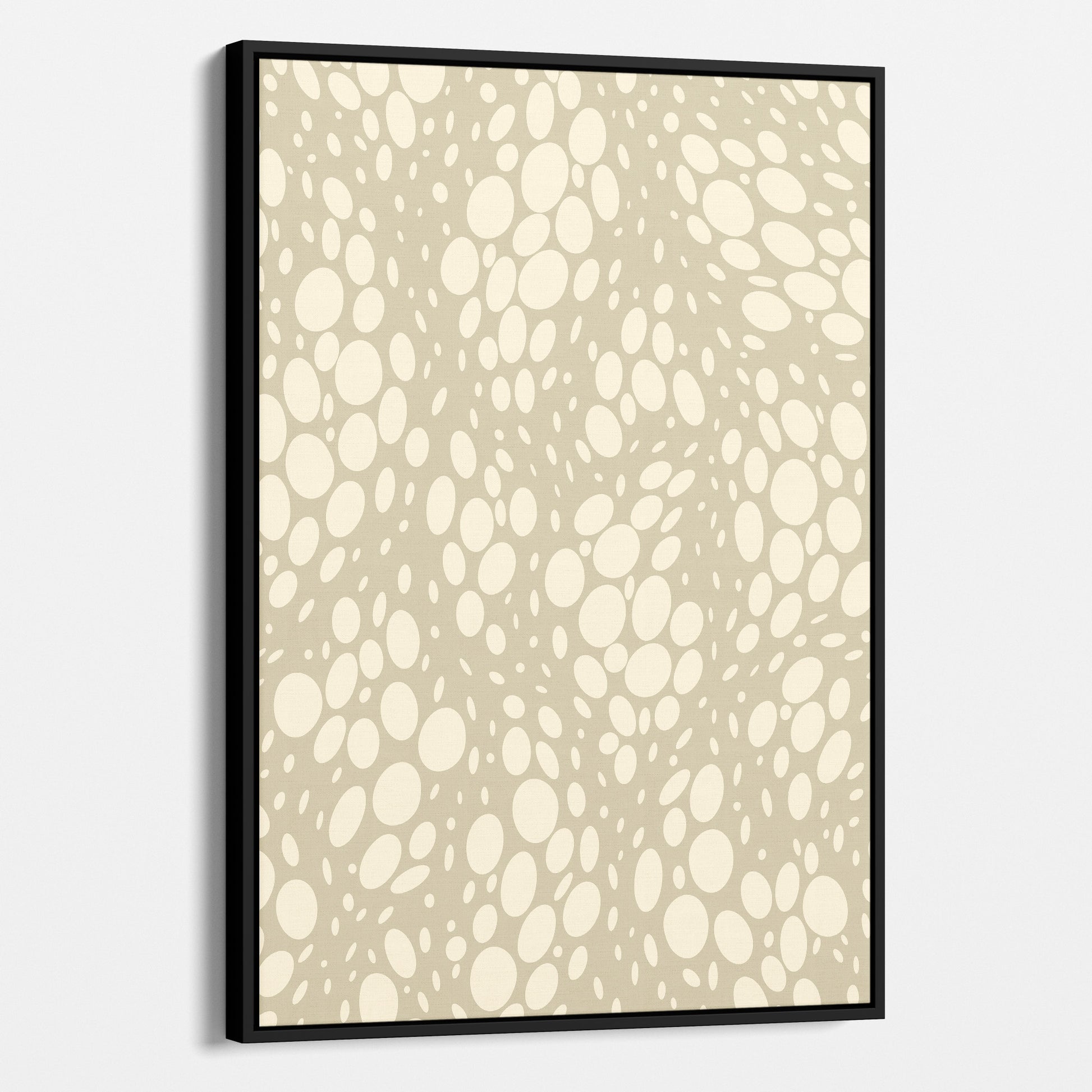Spots Stone abstract wall art angled view showing frame depth - dynamic organic polka dot design with scattered cream spots