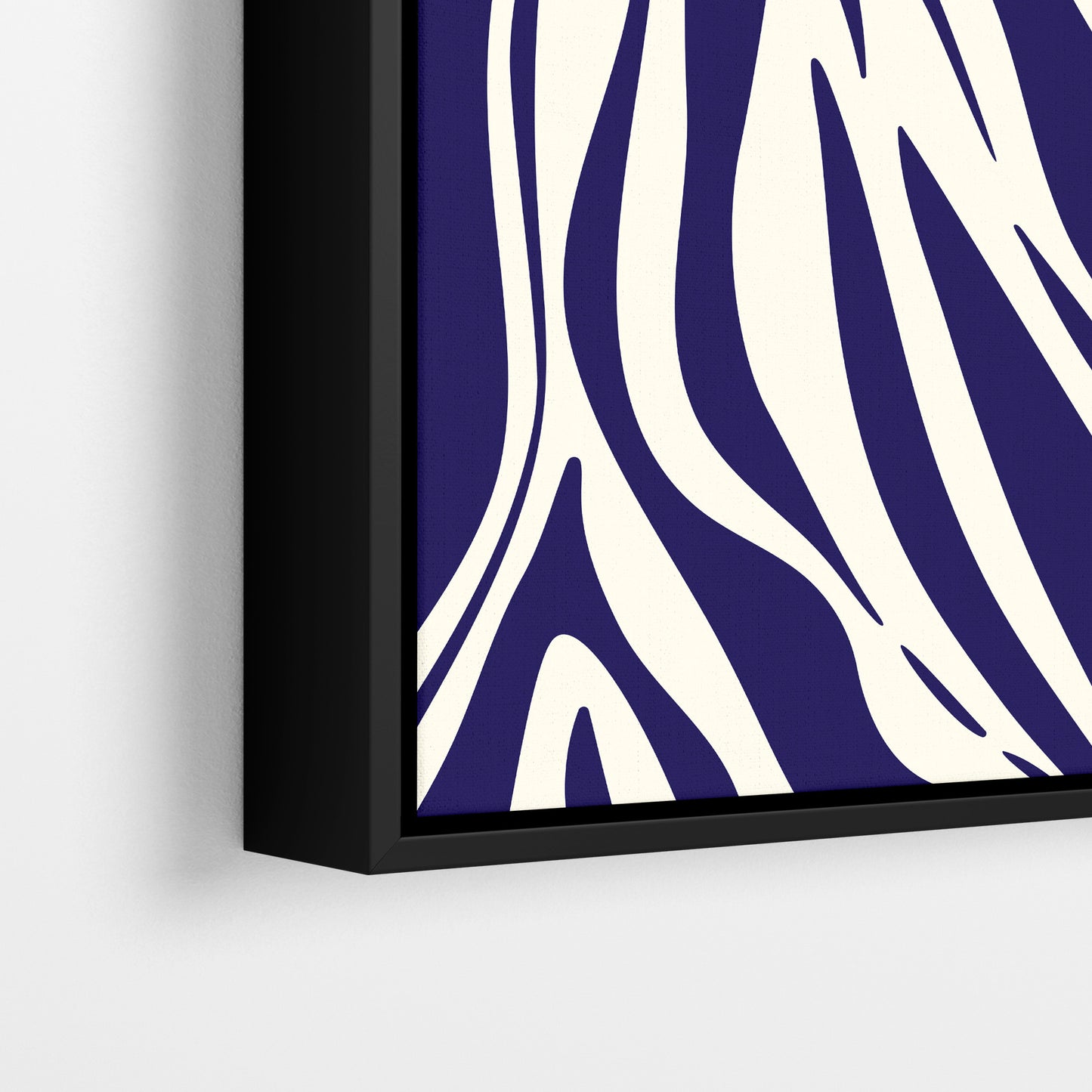 Close-up detail of Paloma navy framed abstract print - fluid interlocking forms creating zebra-like pattern in navy and cream