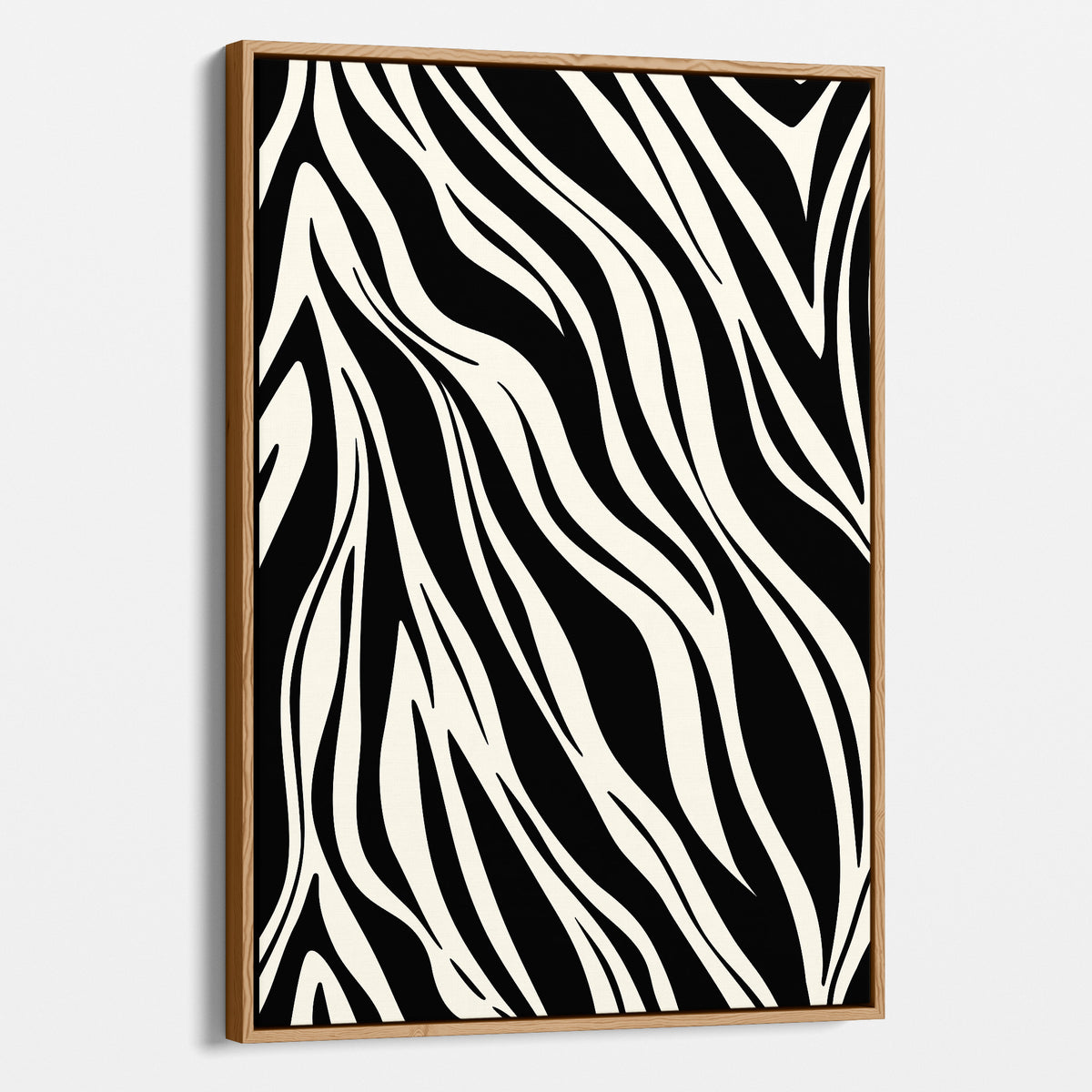 Paloma Black a framed canvas wall art featuring a bold black and off-white zebra stripe pattern, shown hanging against a light grey wall.