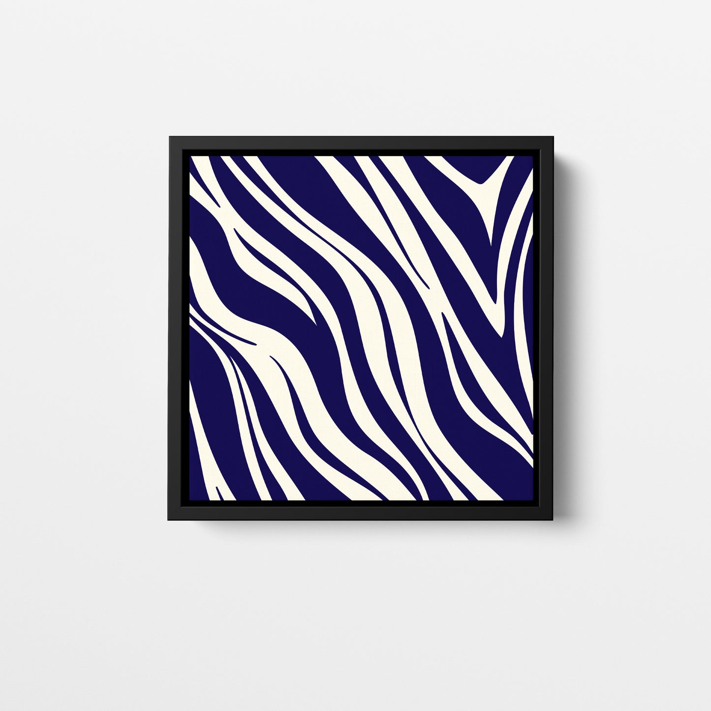Paloma navy mini geometric wall art - bold abstract zebra-like pattern with sweeping curves in navy and cream, framed print front view
