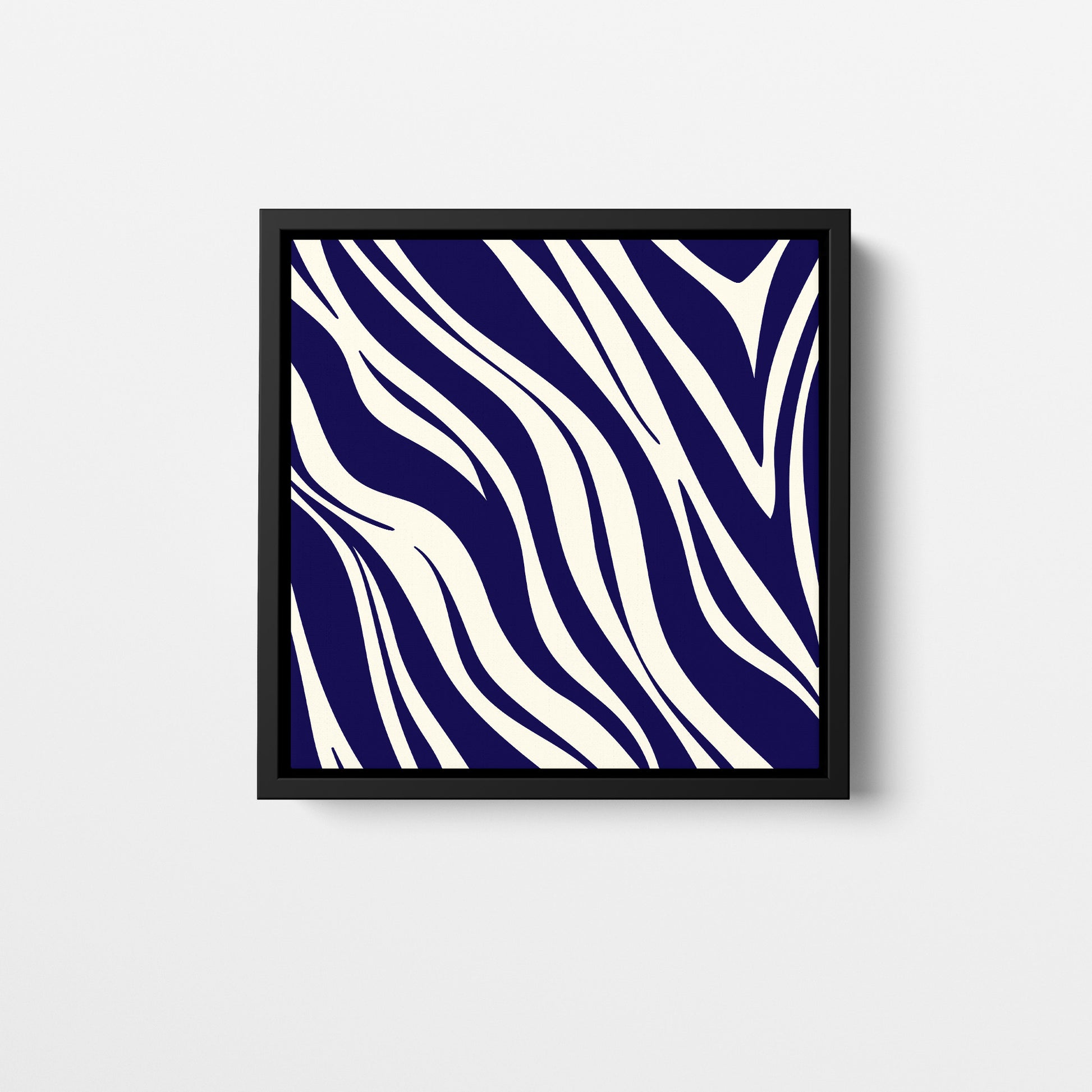 Paloma navy mini geometric wall art - bold abstract zebra-like pattern with sweeping curves in navy and cream, framed print front view