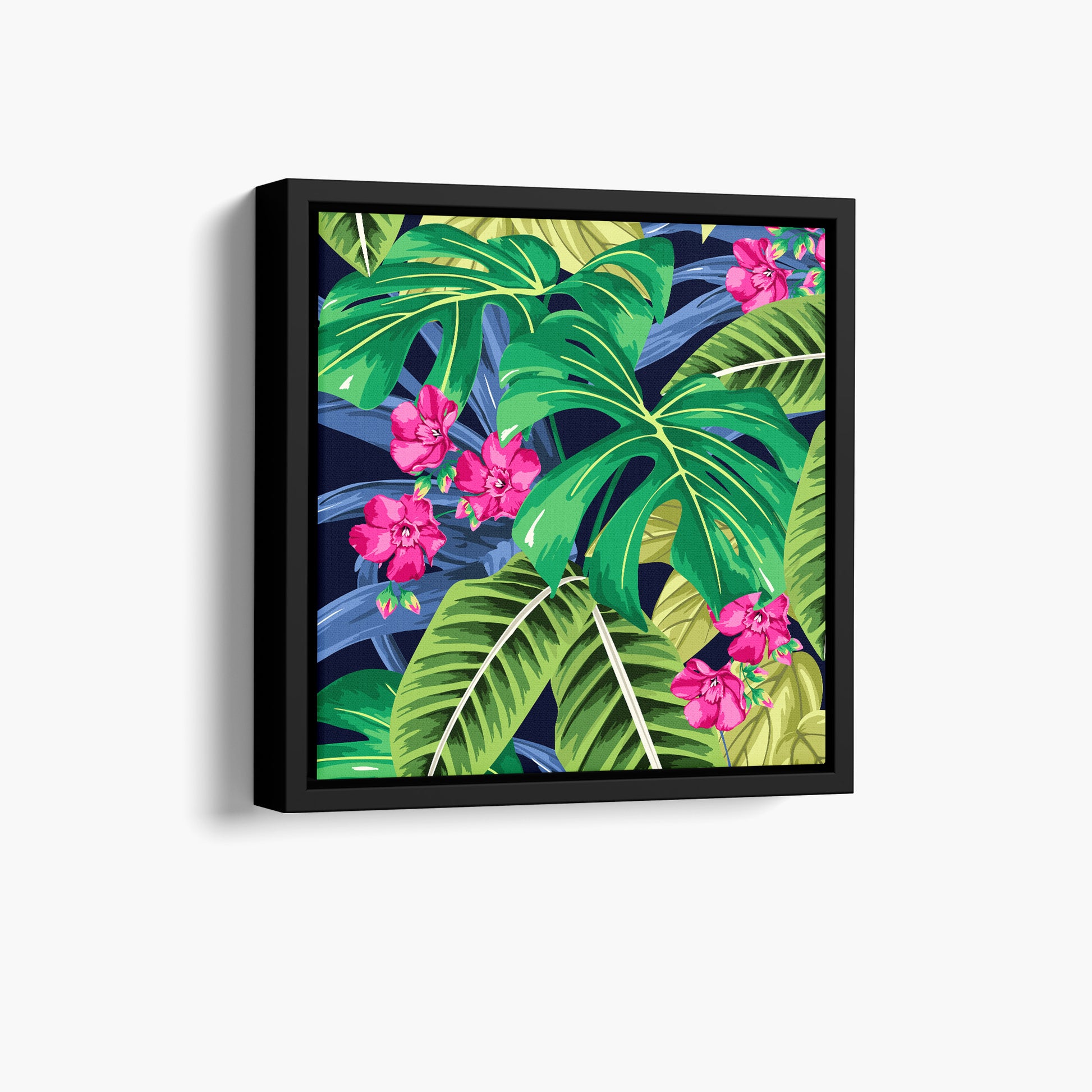 Framed Solana Pink tropical mini wall art angled view showing frame depth - lush monstera leaves and palm fronds with pink floral accents