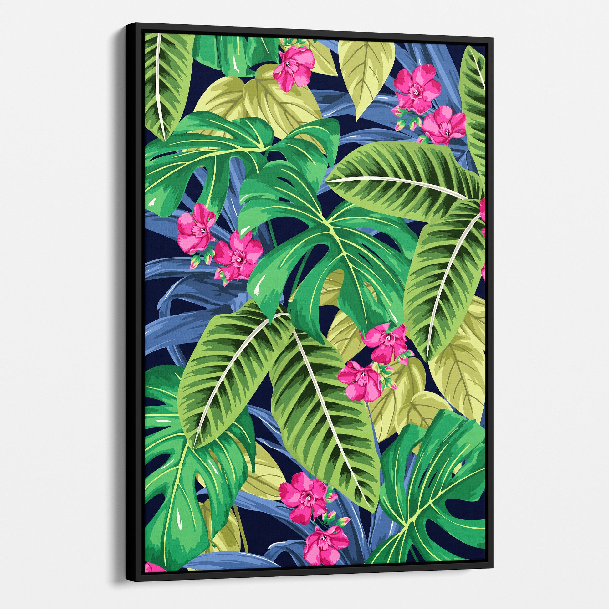 Framed Solana Pink tropical wall art angled view showing frame depth - lush monstera leaves and palm fronds with pink floral accents