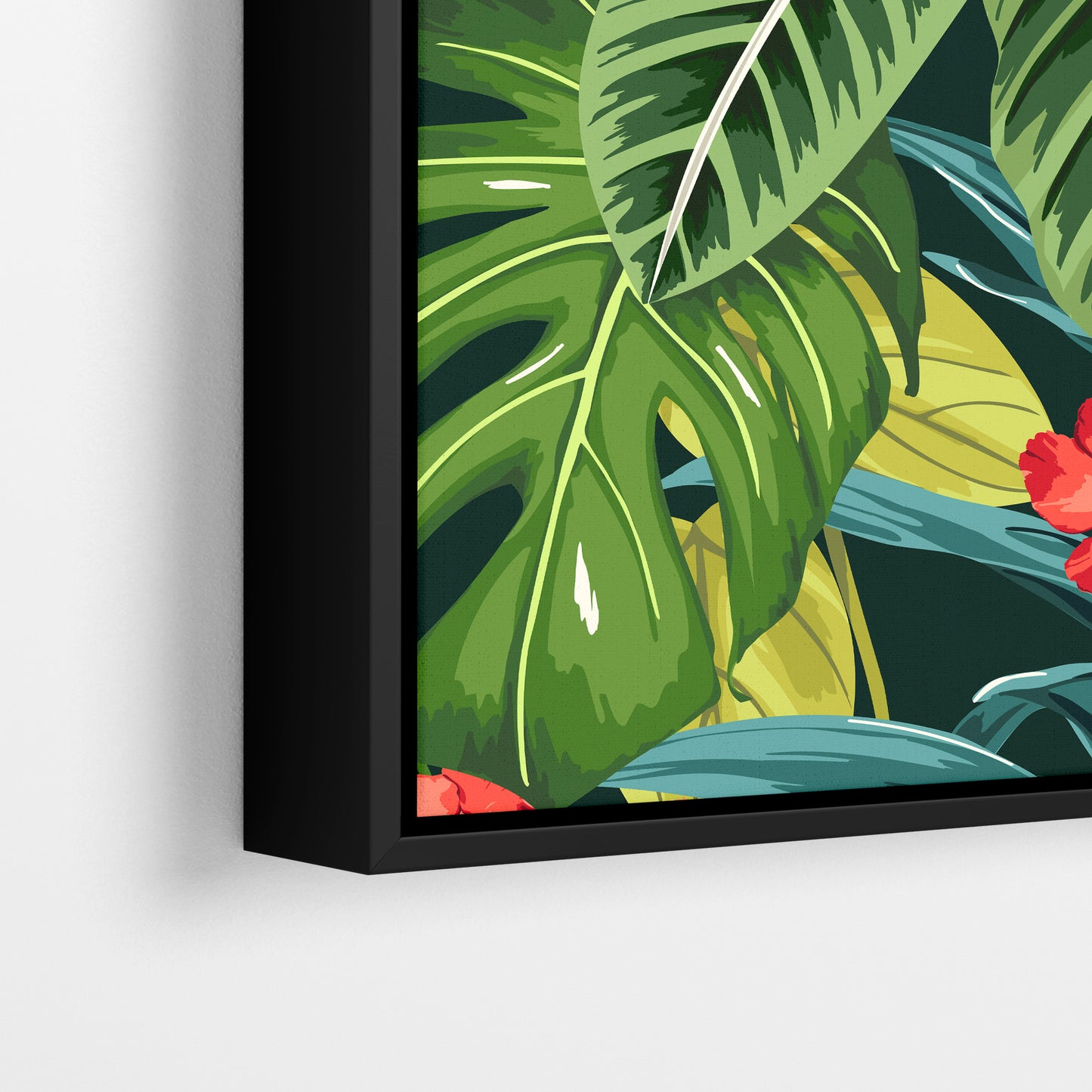 Close-up detail of Solana Scarlet framed tropical print - jungle foliage in green tones with striking scarlet flowers on dark green