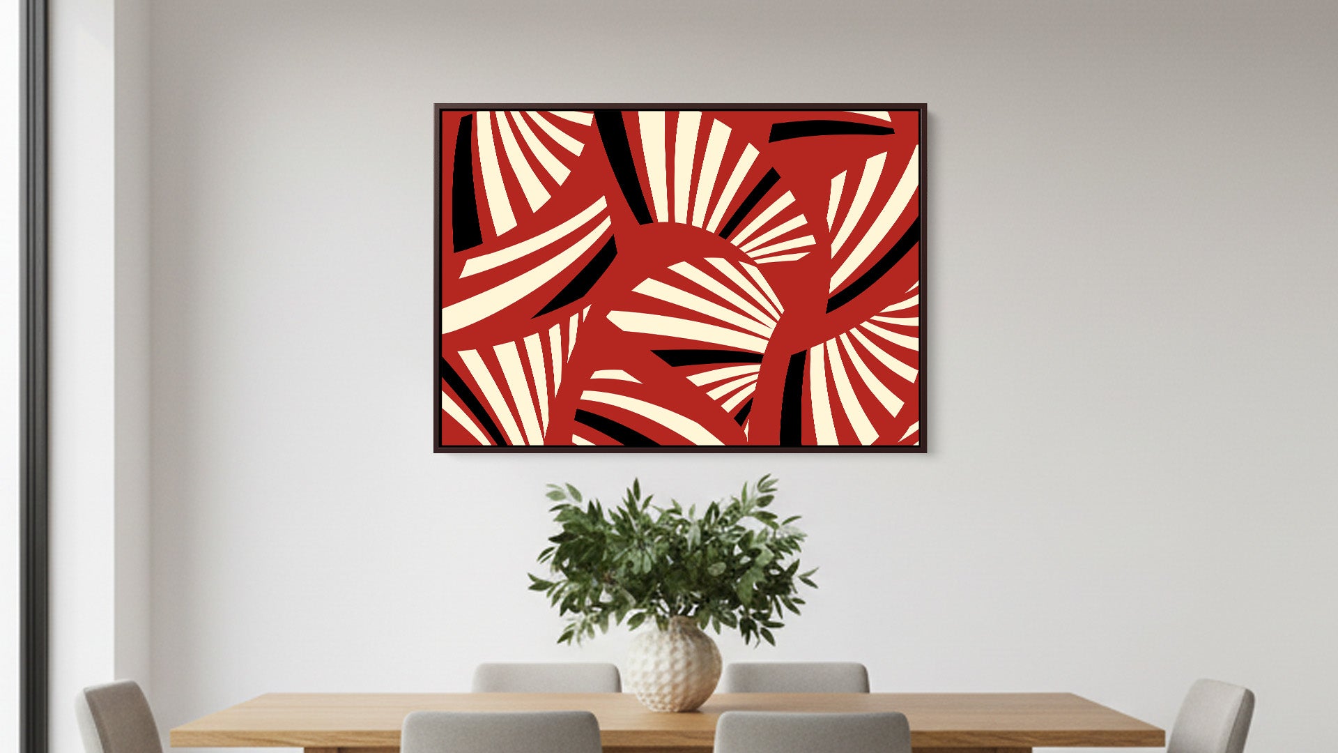 Abstract art deco red and white artwork on a wall above a dining table with chairs.