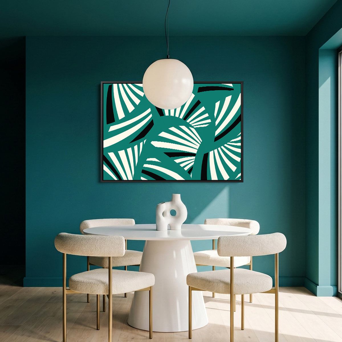 Charleston Teal framed wall art print with bold black and white palm leaf patterns hangs on a deep teal wall above a modern white dining table and chairs in a stylishly decorated room.