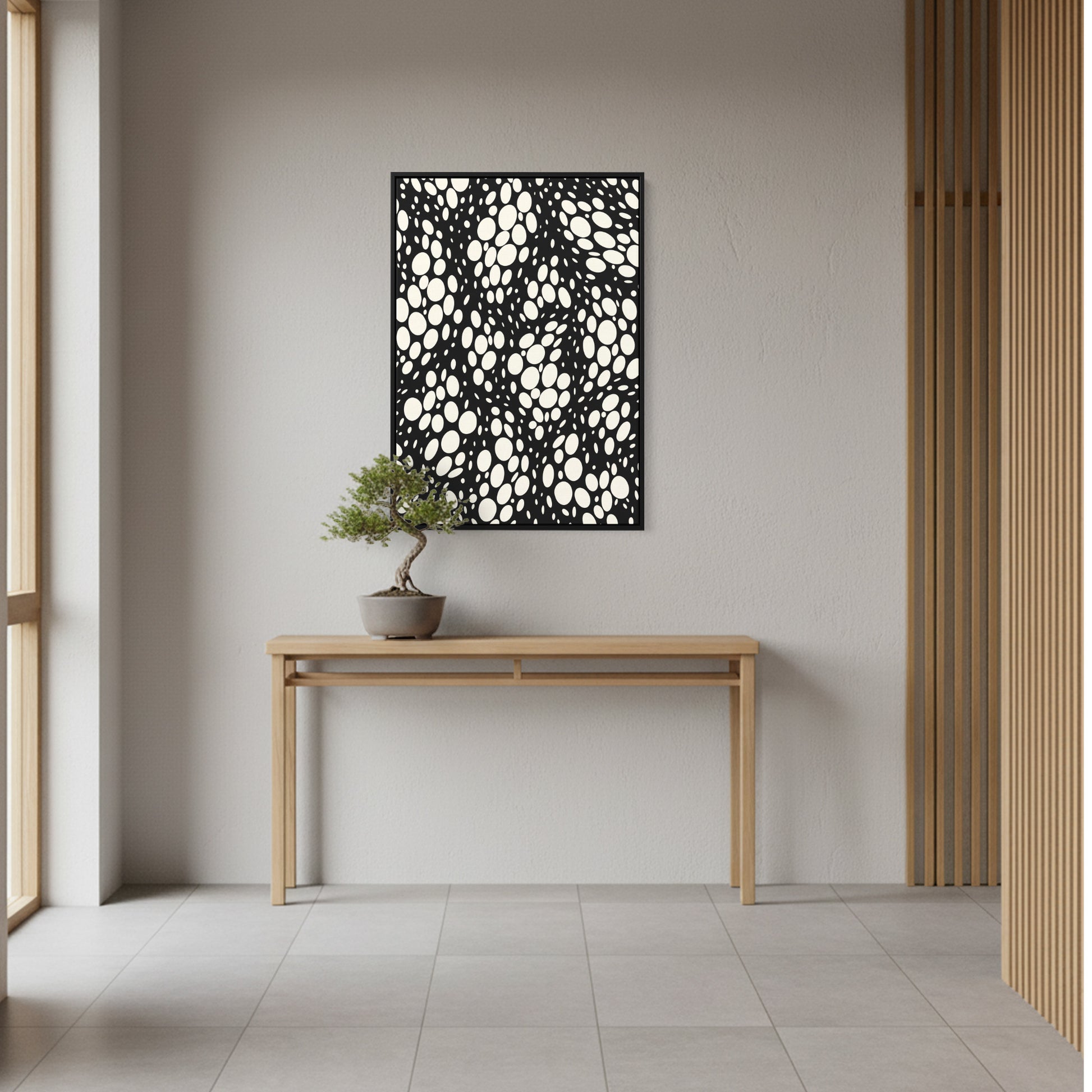 Modern interior with a wooden console table and decorative Lauren black wall art.