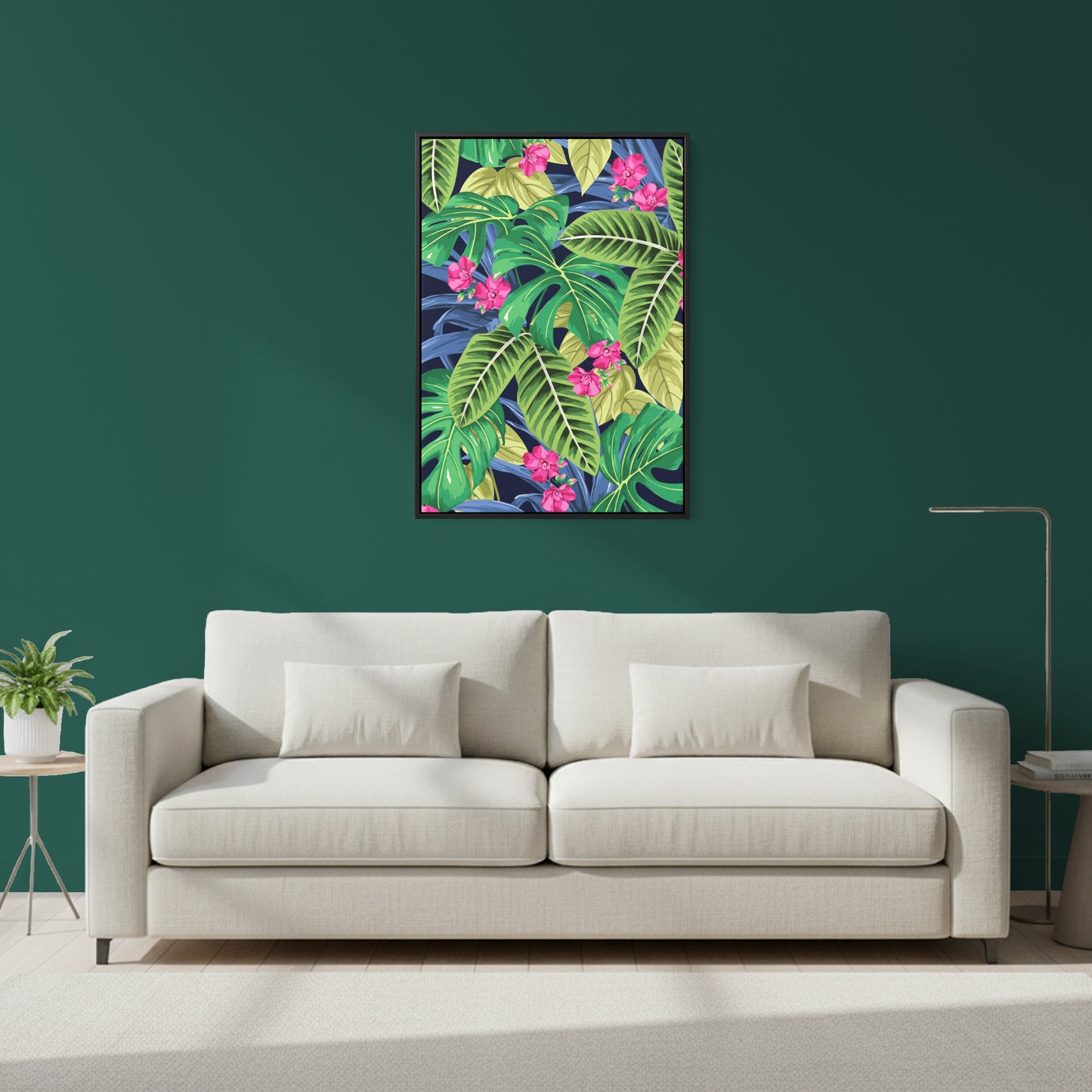 Beige sofa in a living room with a colourful Solana Pink tropical leaf painting on the wall.